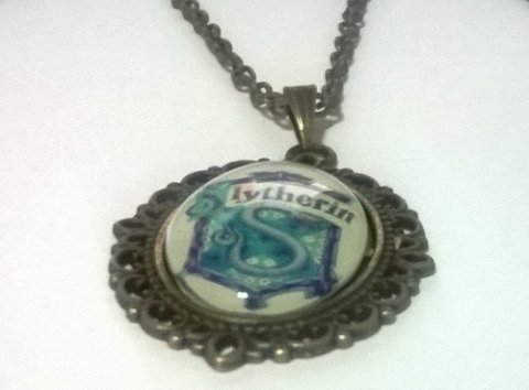 Брелок Harry Potter Slytherin 4х3 см. -   -  