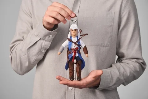 Брелок WP Merchandise плюшевый ASSASSINS CREED Ratonhnhaké: ton 20 см. -   -
